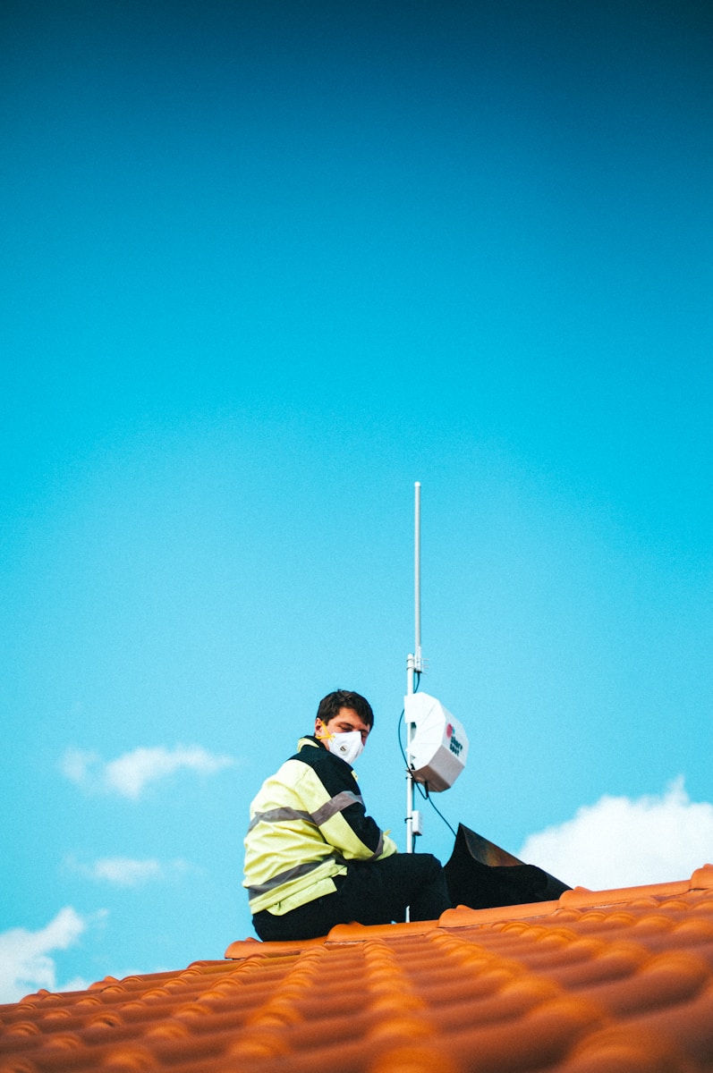 a man in a blue sky
